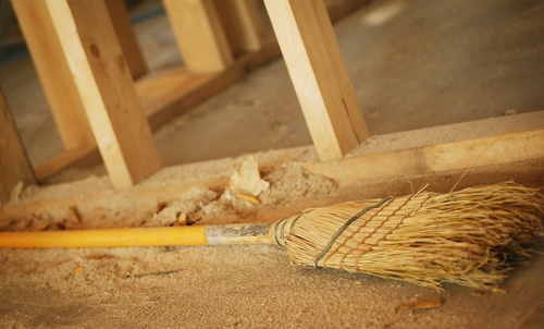 New construction home in Weston with dust on the floor with a broom