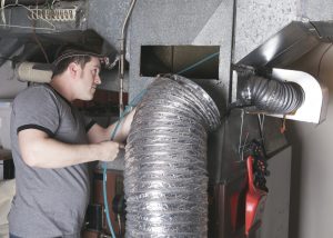 man performing a marine odor removal in Miami