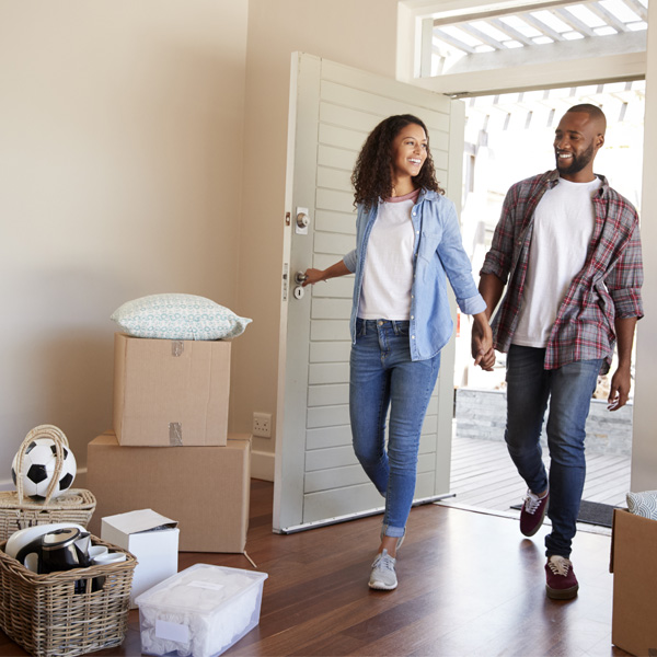 Couple walking into a new home after Home Air Quality inspection  in Coral Springs, FL