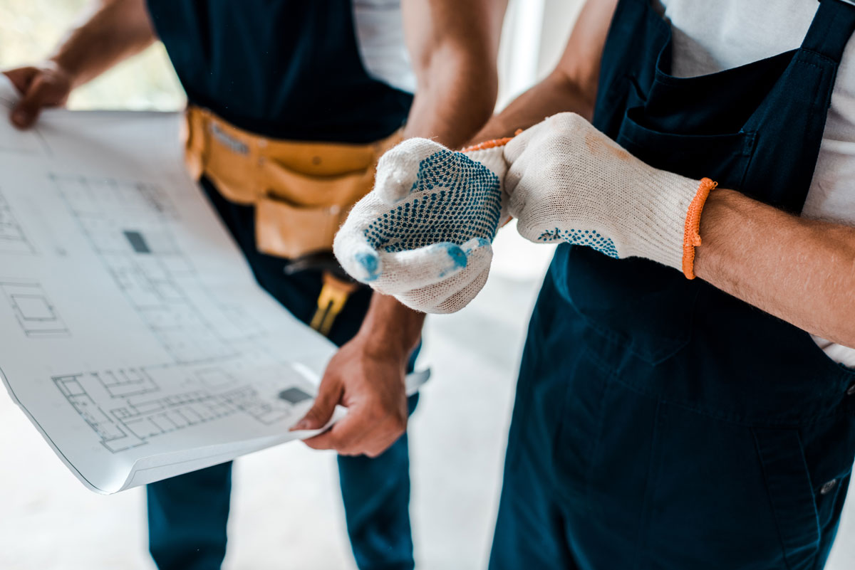 workers remodeling a home that requires Dust Removal, Air Duct Cleaning, and Post-Construction Clean-Up for Moving Into a New Home and Post-Remodeling in Pompano Beach, FL